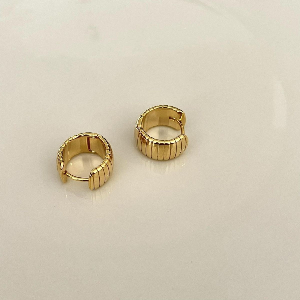 Thread C earrings