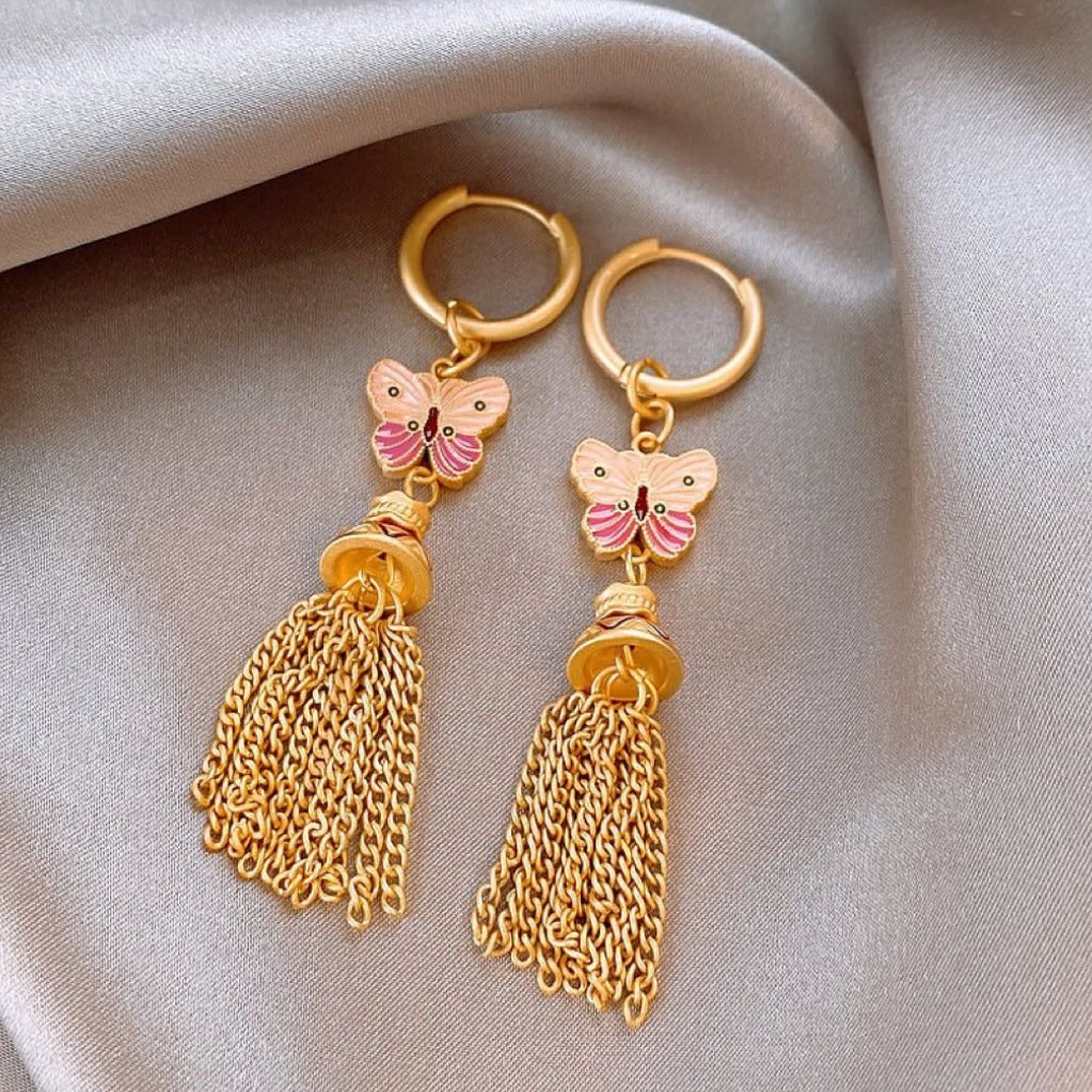 Pink butterfly earrings in golden glaze