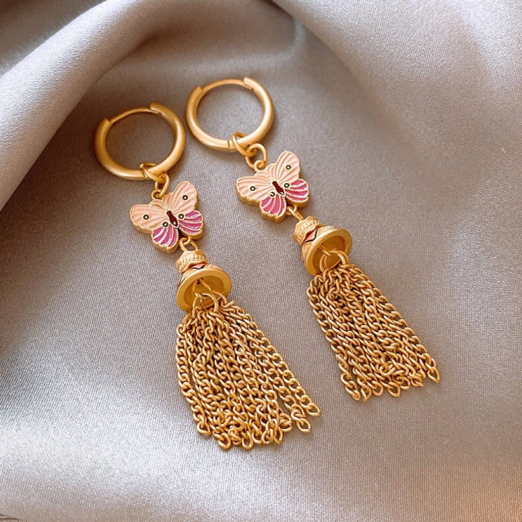 Pink butterfly earrings in golden glaze