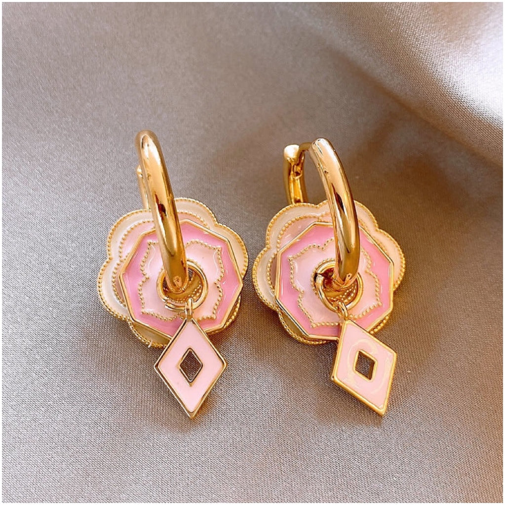 Pink flower earrings with golden glaze