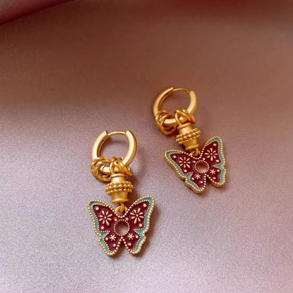 Handmade glazed golden butterfly earrings