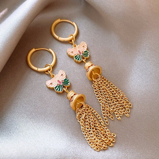 Pink butterfly earrings in golden glaze