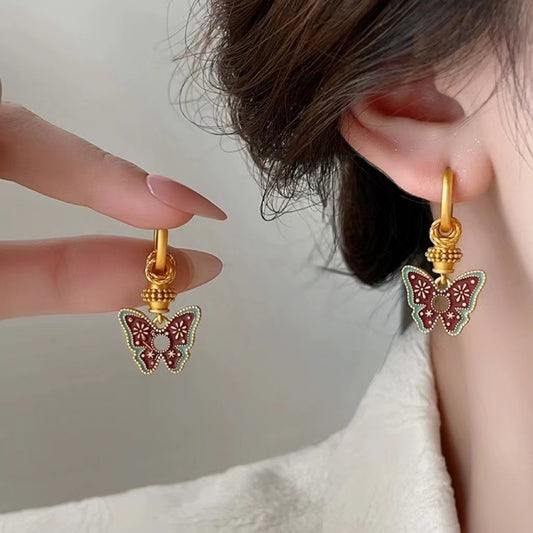 Handmade glazed golden butterfly earrings