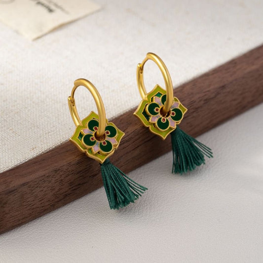 Green flower earrings with golden glaze