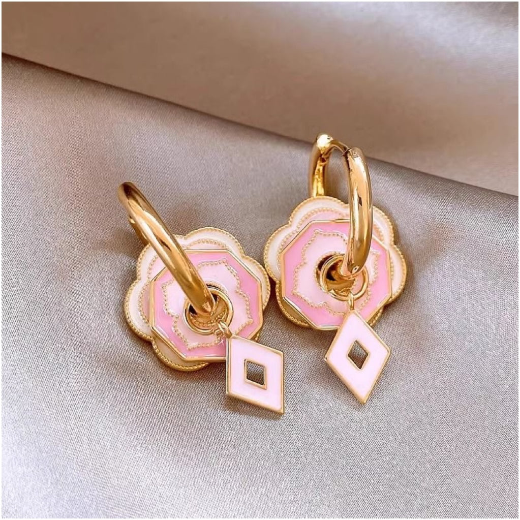 Pink flower earrings with golden glaze