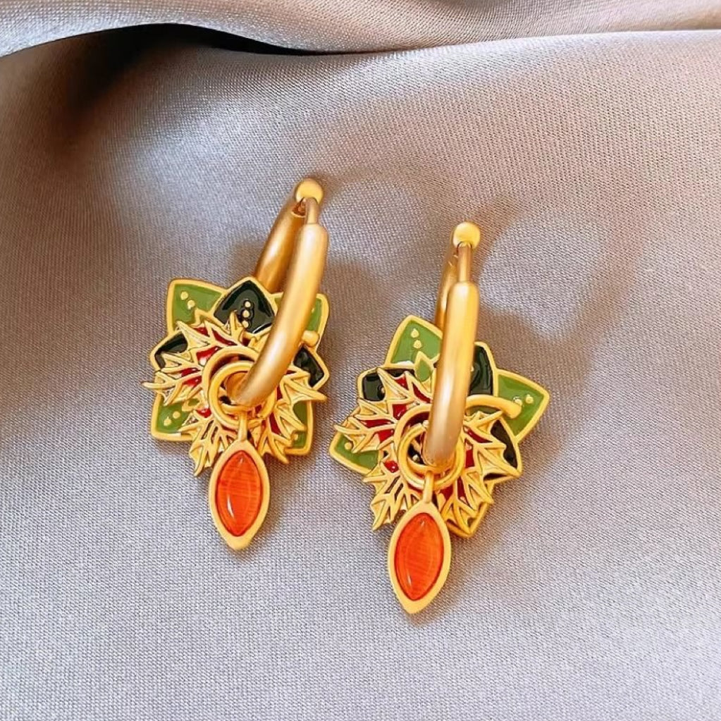 Orange flower earrings in golden glaze