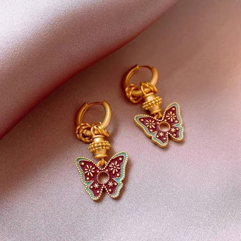 Handmade glazed golden butterfly earrings