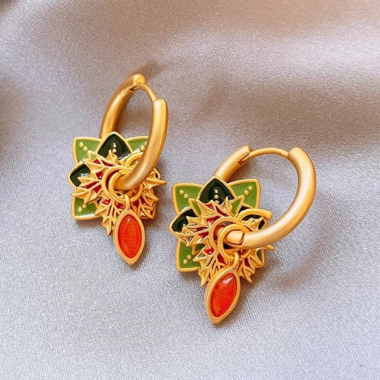 Orange flower earrings in golden glaze