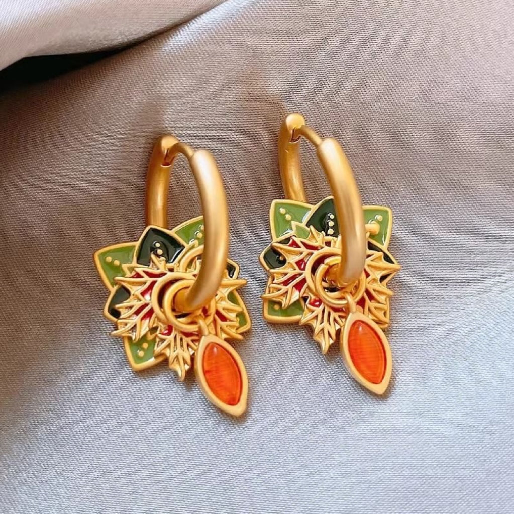 Orange flower earrings in golden glaze