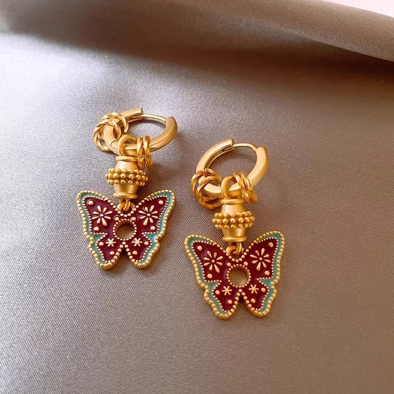 Handmade glazed golden butterfly earrings