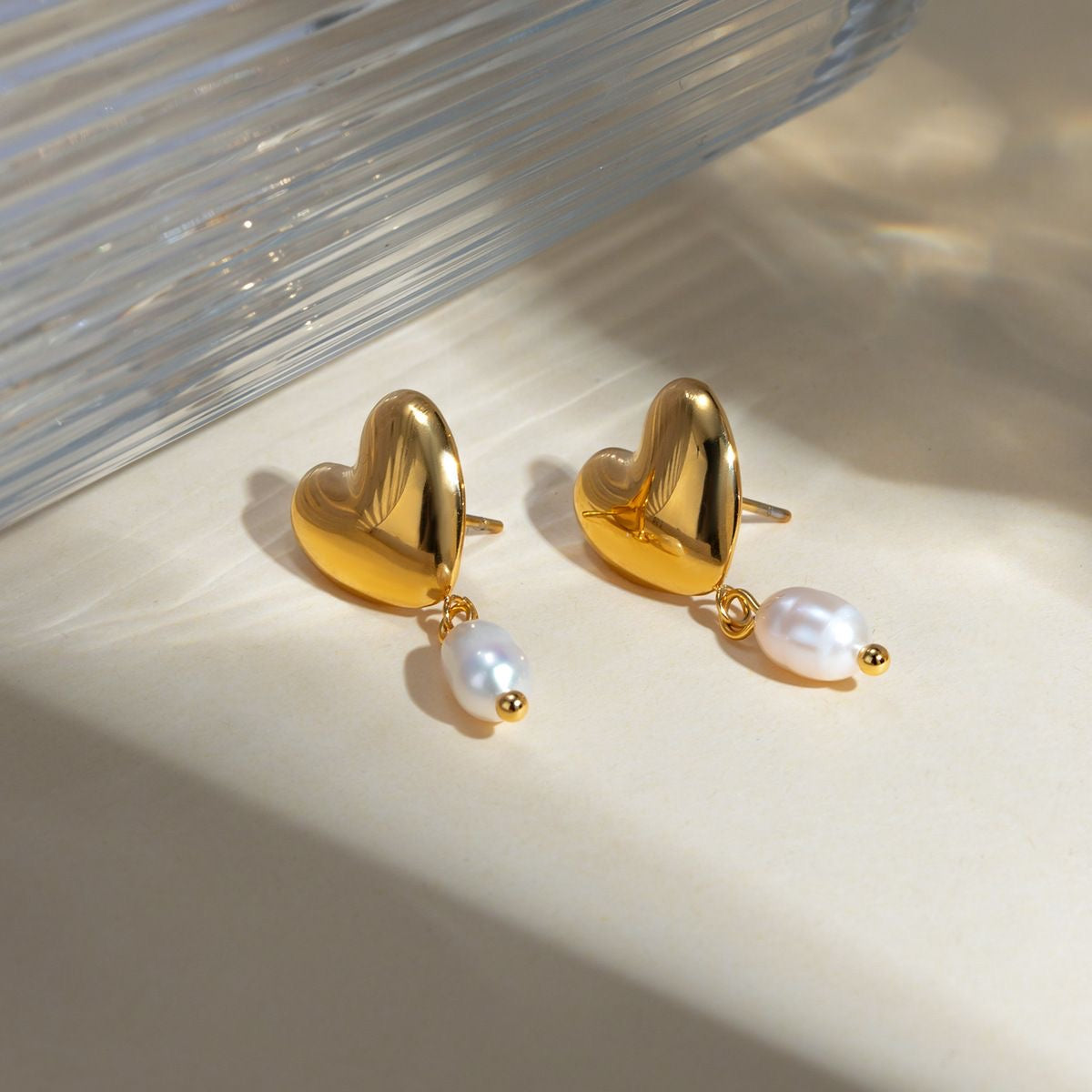 Pearl heart stud earrings